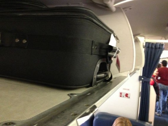 roller bag in Delta 1st class seating