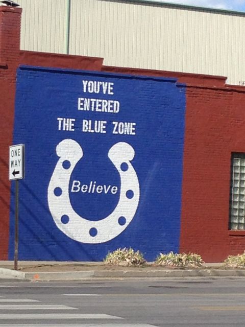 Indianapolis building with large mural "Believe"