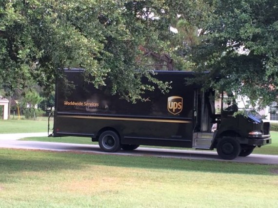 UPS delivery truck in rural neighborhood