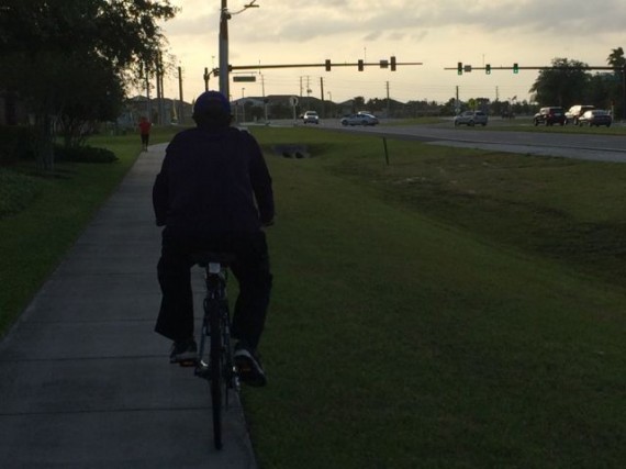 People exercising on sidewalk near Walt Disney World