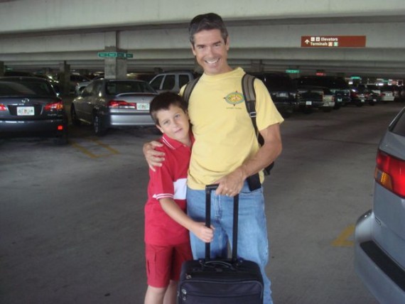 Father and son at airport