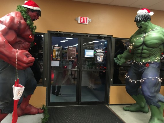 Two int Hulk statues at Coliseum of Comics