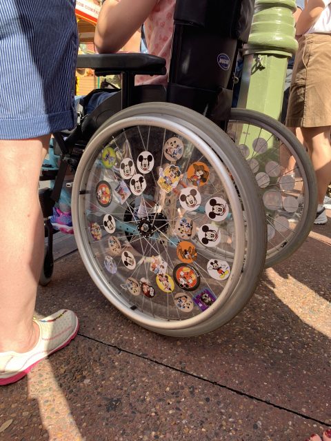 child wheelchair with Disney stickers