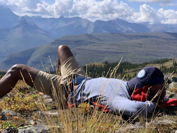 man napping in mountains