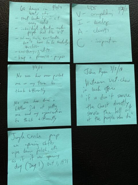Five Post-it notes on a sheet of paper with handwritten notes