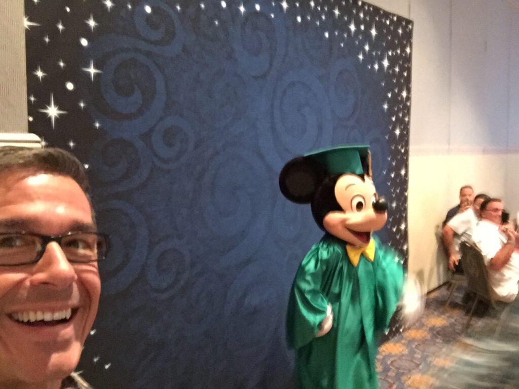 Disney Institute speaker Jeff Noel and Mickey Mouse