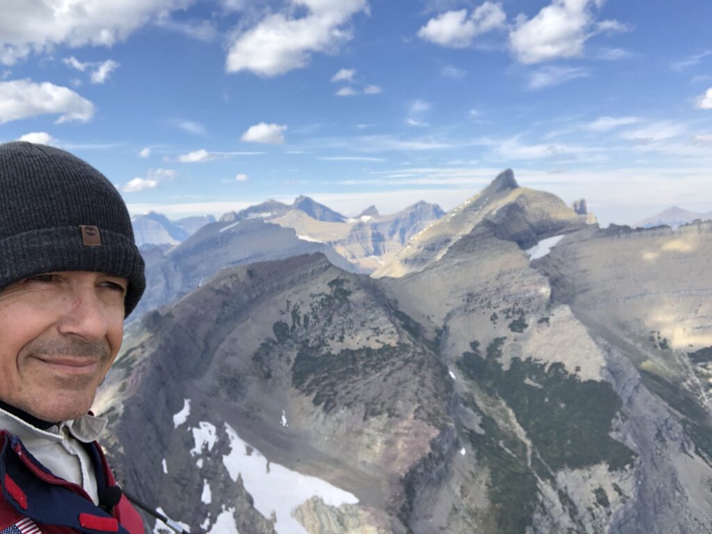 Disney Keynote Speaker Jeff Noel on a mountain