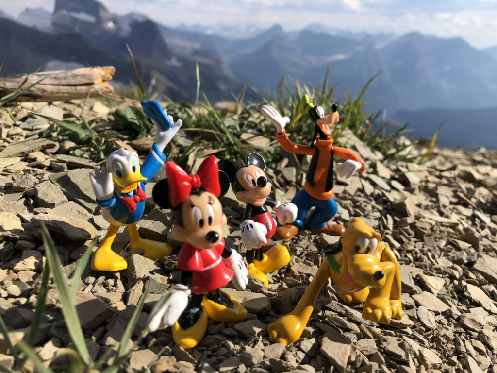 mountains with some small Disney toys