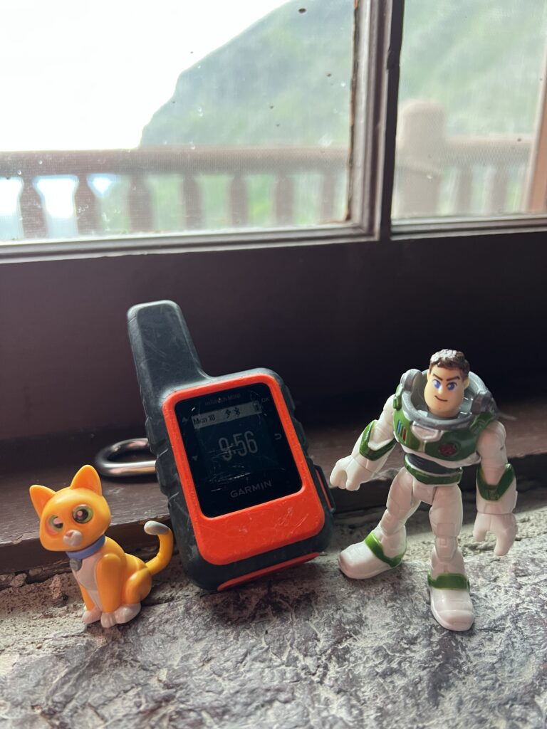 Small Disney figurines with a miniature GPS device