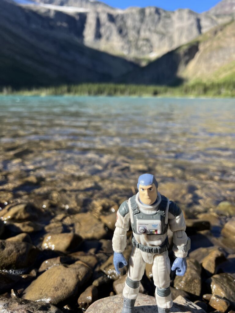 Light-year toy figurine in mountains