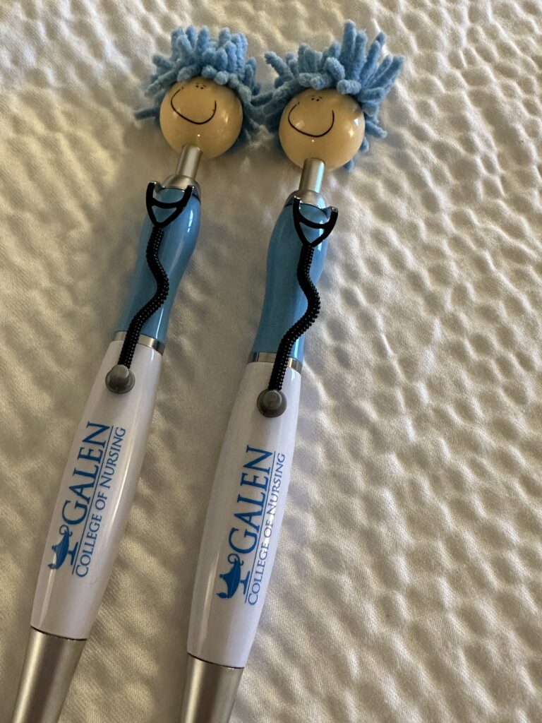 To writing pens shaped like a person