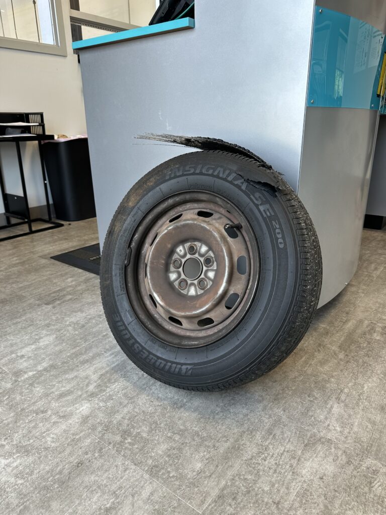 Blown tire on floor