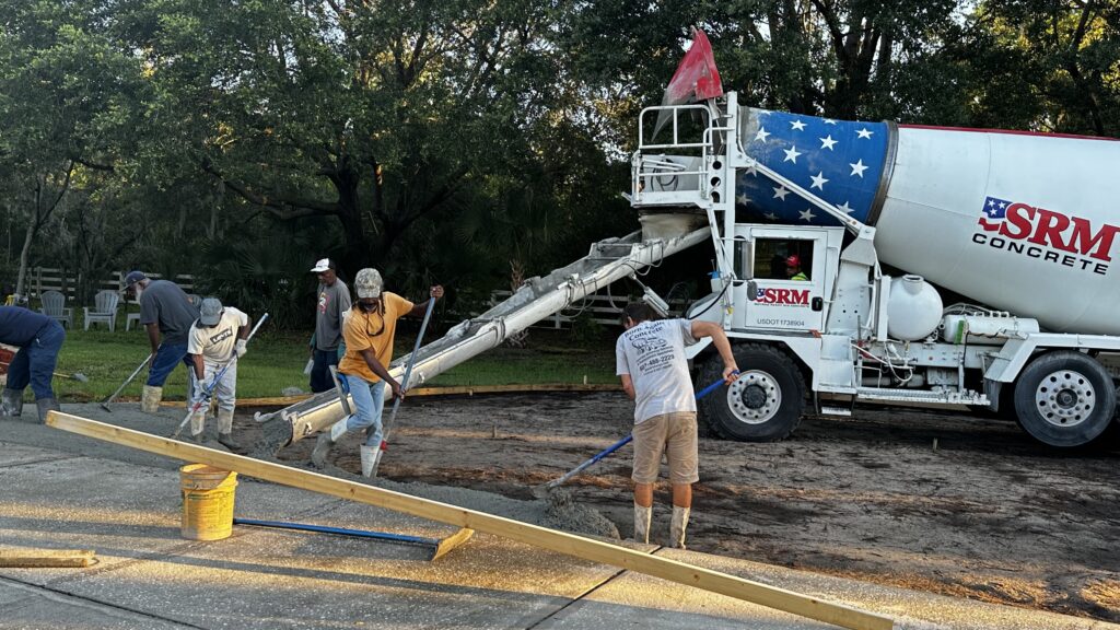 Concrete crew pouring a residential driveway