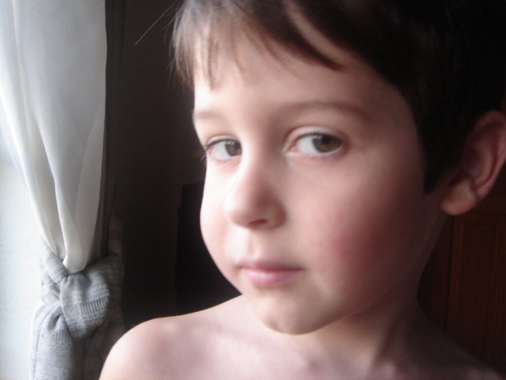 child staring into camera