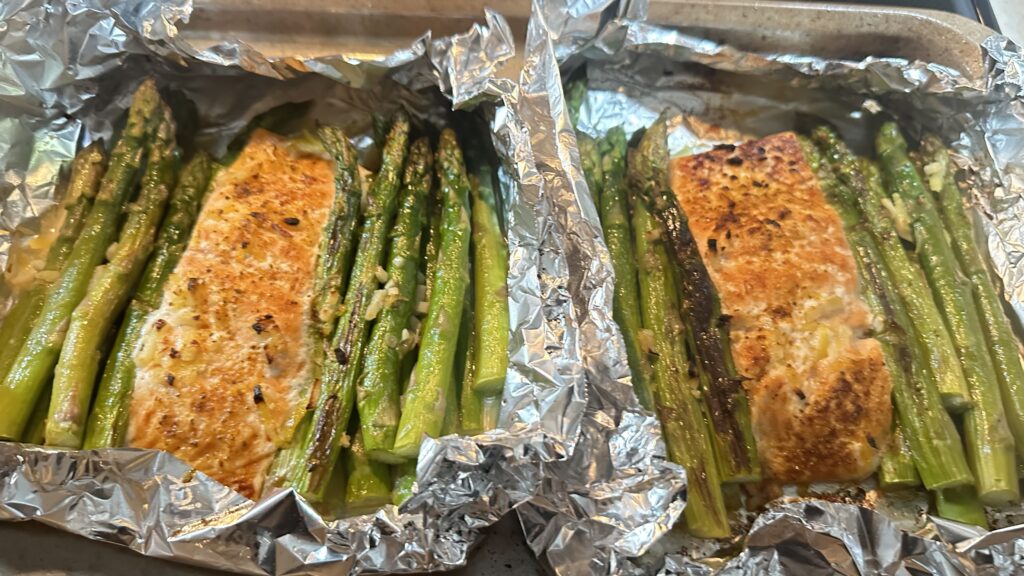 Two salmon fillets with asparagus