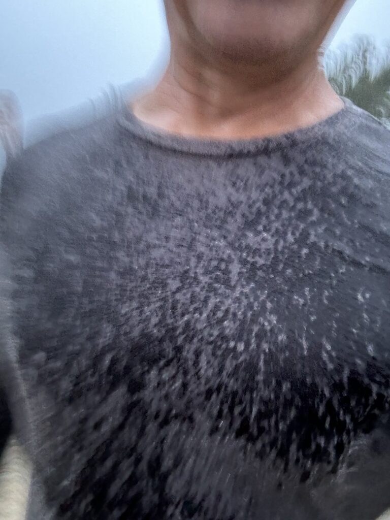 person in tee-shirt in the rain