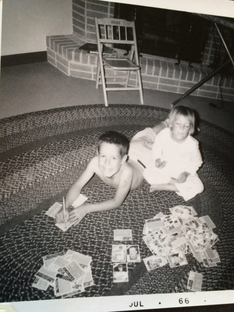 Two kids on a living room floor