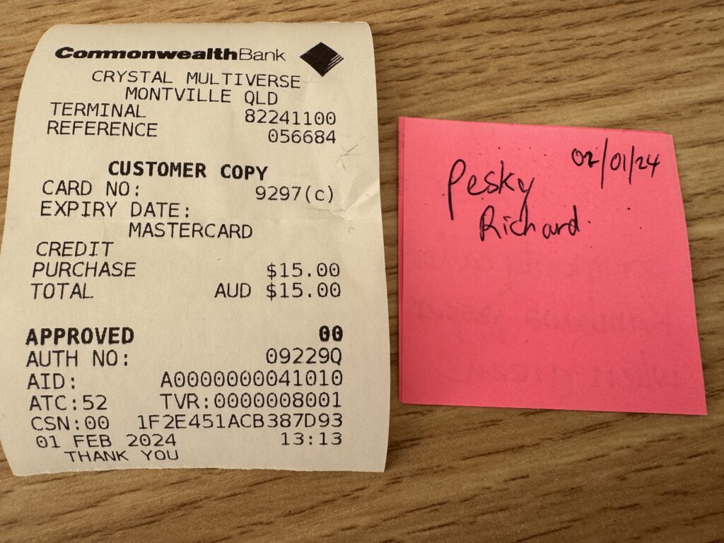 Sales receipt and post it note