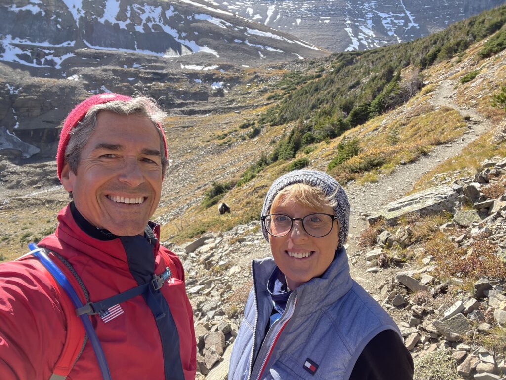 two people on a mountain trail