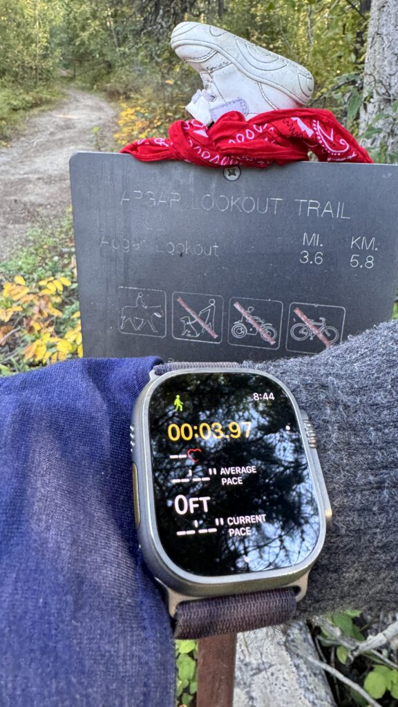 Apple Watch and Trail head sign