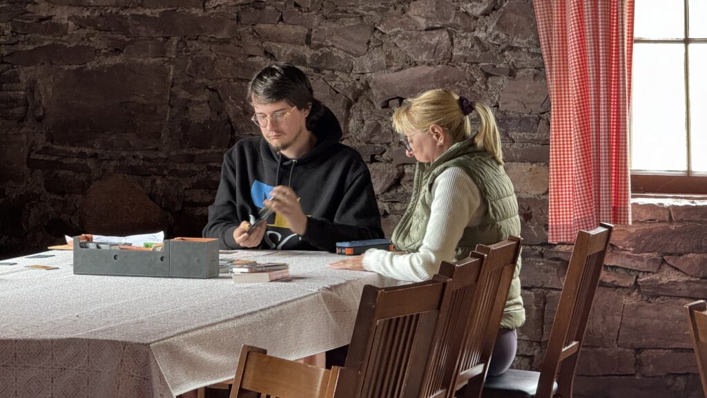 two people sitting at a table