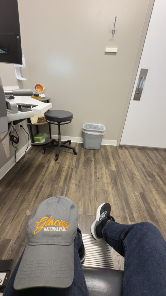 person sitting in a dr office