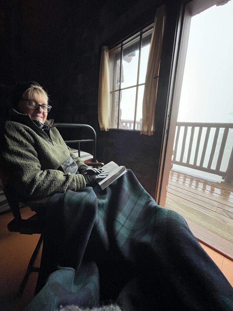 woman bubbled up at a mountain chalet